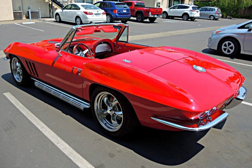 red corvette in sunlight somewhere in the usa