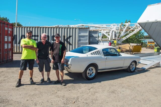 Satisfied customer with his American dream car after its arrival in Sweden from the USA.